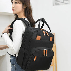 2-in-1 Baby Rucksack mit integriertem Wickelbett